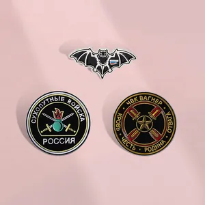 Three-piece punk enamel pin set featuring a black bat and Russian military shield badges