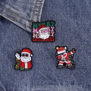 Detailed view of 3-pack Christmas enamel pins featuring cool Santa on denim fabric