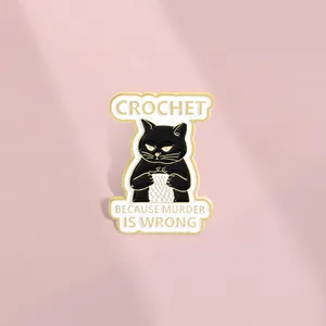 Funny black cat crochet enamel pin with Crochet Because Murder Is Wrong text badge