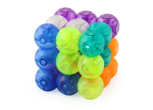 Close-up of translucent colorful spheres forming a magnetic 3x3 puzzle cube toy