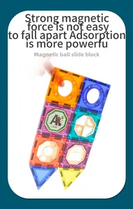 Detail of colorful magnetic building tiles showing strong magnetic suction and educational prints