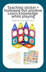 Detail of colorful magnetic tiles with alphabet stickers for educational building fun