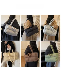 Collage of six colors for large quilted puffer tote bags worn by a model in interior