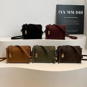 Minimalist vintage square crossbody bag with gold lock and metal rivets in five classic colors