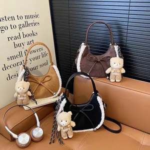 Winter faux fur dumpling bags in black brown and camel colors with cute bear charms