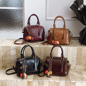 Vintage Boston leather crossbody bag set in four colors with leaf charms
