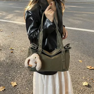 Retro olive green matte tote bag with large capacity and plush bunny charm on shoulder