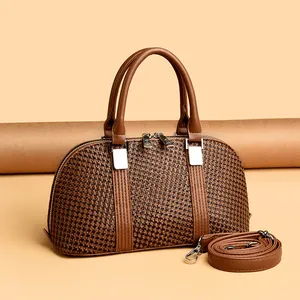 Vintage woven texture Boston handbag in brown leather with adjustable shoulder strap