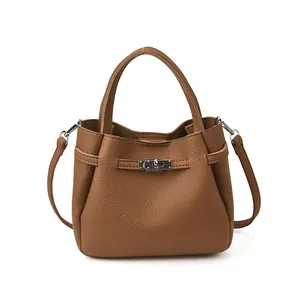 Retro brown lychee leather bucket bag with top handle and detachable shoulder strap