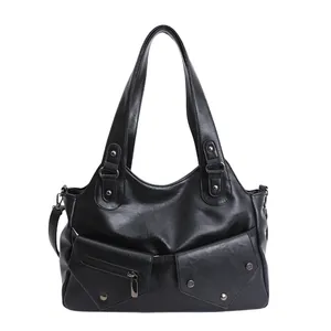 Classic black vintage tote bag in high-quality PU leather with metal rivet details