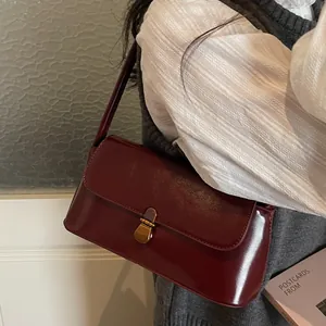 Vintage burgundy glossy baguette bag with gold metal lock for women's daily fashion
