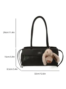 Quilted black shoulder bag dimensions 32x15x8.5 cm with rabbit charm and metal clasp