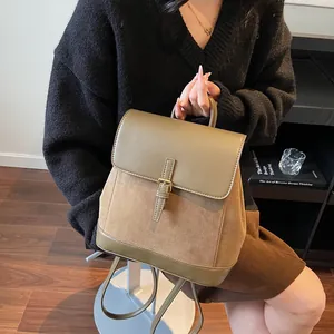 Vintage suede backpack in olive green and brown patchwork for casual urban commute