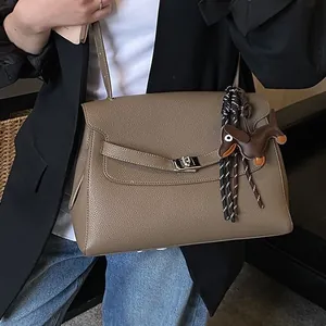 Vintage dark brown pebble leather briefcase bag with silver twist lock and puppy charm