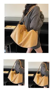 Macro detail of large light brown frosted leather tote bag showing soft suede texture