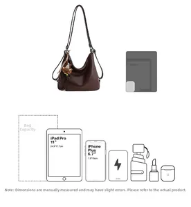Detail view of large capacity vintage brown shoulder bag fitting 11 inch iPad and essentials