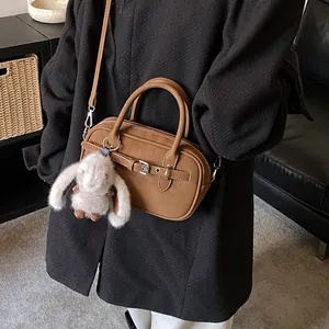 Caramel retro small square bag with plush rabbit charm and crossbody strap for women