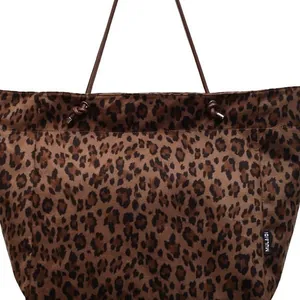Retro leopard print faux suede tote bag with drawstring detail and slim shoulder straps