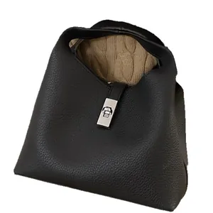 Retro black lychee grain leather bucket bag with silver lock and knit lining detail