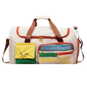 Large capacity weekend travel bag in off-white nylon with colorful contrast pockets