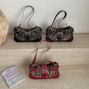 Retro leopard print hobo bags with silver buckles and studs in black, red, and brown
