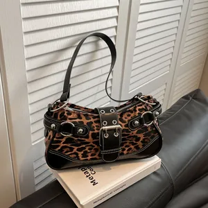 Vintage leopard print shoulder bag with silver studs and large buckle details