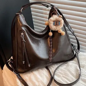 Women's Vintage PU Leather Hobo Shoulder Bag Large Capacity Crossbody Tote Bag With Plush Pendant Multi-Functional Backpack