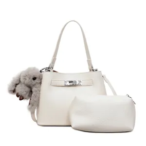 Minimalist white litchi pattern bucket bag with plush rabbit charm and inner pouch