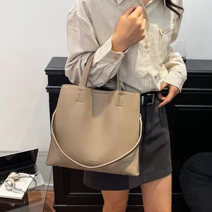 Chic beige lychee pattern tote bag for women showing spacious commuter shoulder style
