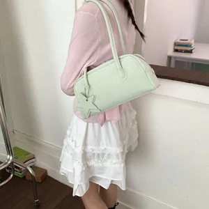 Mint green minimalist leather Boston shoulder bag with star charm and long handles
