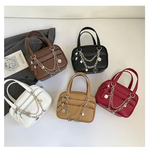 Top view of multi-color structured totes with gold chains and pebble leather texture