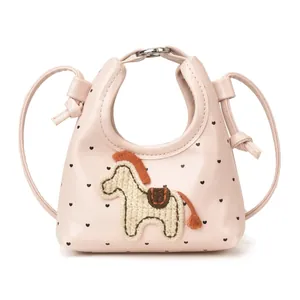 Borsa hobo rosa per bambina con stampa a cuori e toppa a forma di pony intrecciato