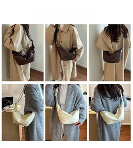 Detailed model shots of the pleated dumpling bag in dark brown and beige leather colors