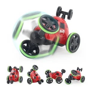 Red 360-degree wireless RC stunt car toy with large green wheels for kids and boys