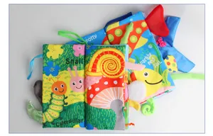 Detail of baby soft cloth book with 3D animal tails for sensory and early education play