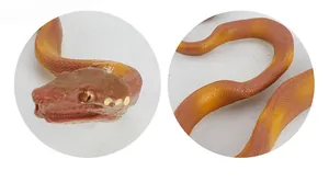 Macro detail of lifelike snake scale texture and realistic head features on a python toy