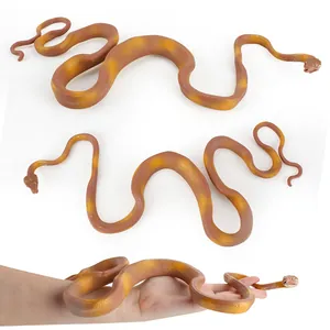 Realistic coiled yellow python model toy made of soft PVC with detailed scale texture