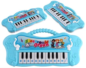 Macro view of blue 13-key electronic organ for kids with portable handle and scale numbers