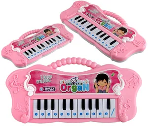 Pink toy piano for kids with 22 keys, featuring a carry handle and cute cartoon design
