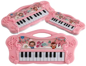 Pink electronic toy piano for kids showing three different sizes in a macro detail view