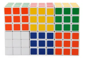 Close-up of classic 3x3x3 speed cube puzzles with smooth white frames and vibrant colors