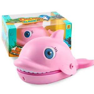 Pink dolphin finger biting game toy with colorful retail packaging box for kids