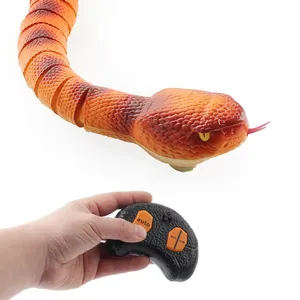 Remote controlled rattlesnake toy with realistic scales and ergonomic infrared controller