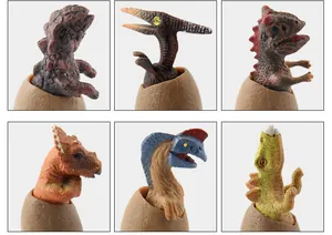 Detailed macro view of six realistic dinosaur hatchling models with textured eggshells