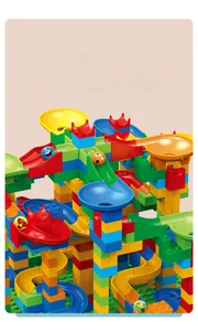 Close-up of vibrant marble run blocks with smooth edges and colorful emoji balls