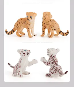 Detailed front and back views of lifelike cheetah and white tiger cub toy figurines