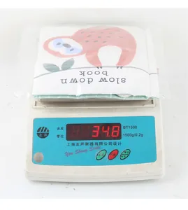Lightweight baby cloth book weighing approximately 34.8g in plastic packaging