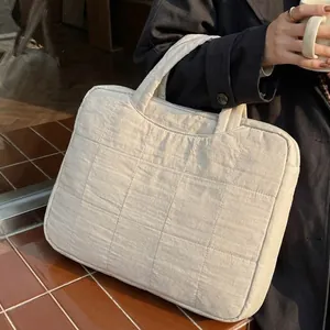 Minimalist beige quilted tote bag for women, spacious laptop storage for daily office use