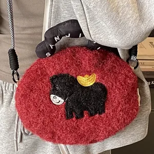 Cute burgundy plush crossbody bag with cartoon embroidery and black woven strap