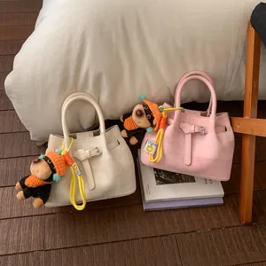 Women Minimalist PU Leather Spliced Bucket Bag Retro Woven Texture Shoulder Crossbody Bag With Puppy Charm For Daily Commute